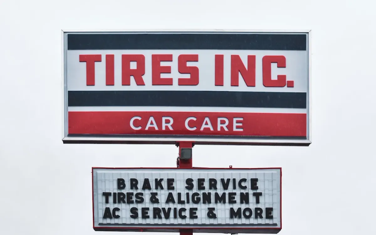The Tires Inc. Car Care sign
